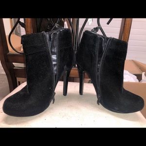 Black heeled booties. Lightly worn.